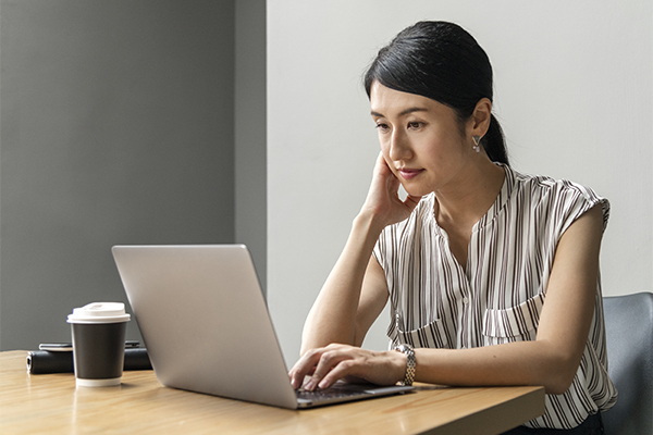 Woman looking at a laptop computer