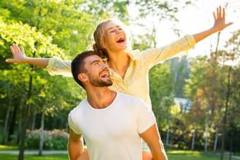 Young couple celebrating after LASIK