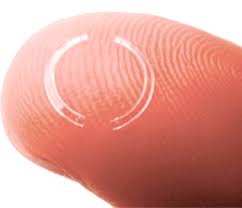 Closeup of an Intacs Implant on the Tip of a Finger